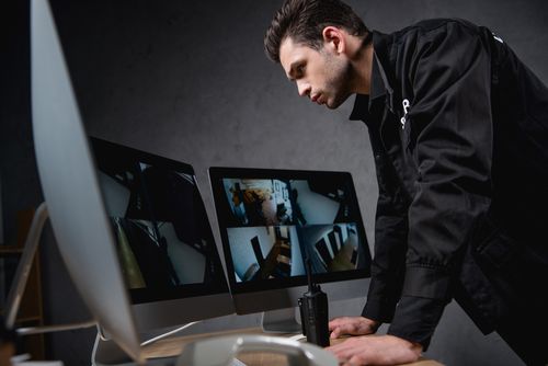 Security Officer Watching Cameras