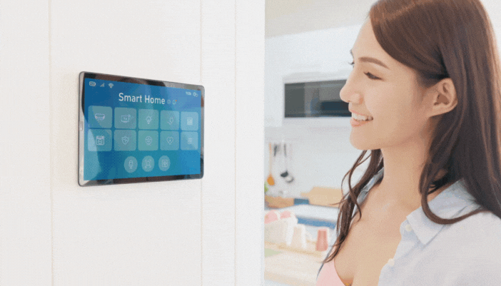 Woman speaking into the control panel to change the power-saving settings