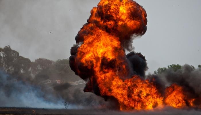 Explosion surrounded by trees