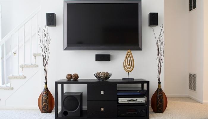 home theater system with widescreen HDTV in modern living room 