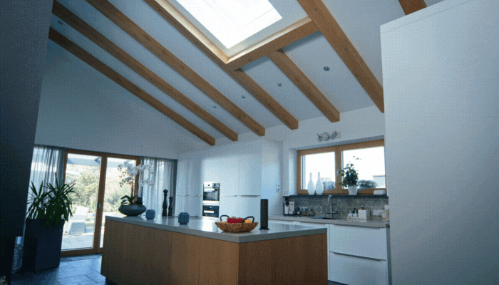 Woman walks into kitchen which then activates the motion-sensor lights