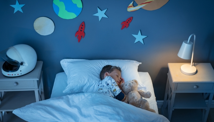 Child sleeping with a night light