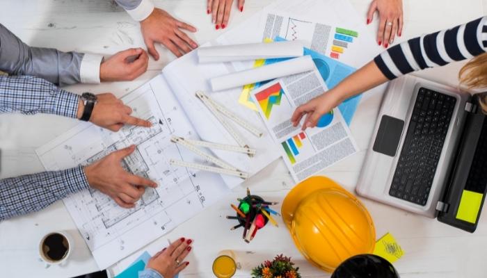 People creating plans and blueprints