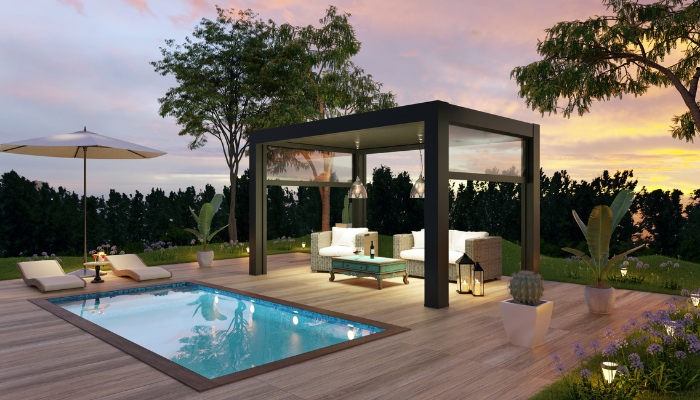Luxurious back patio space with lots of landscape lighting, automated