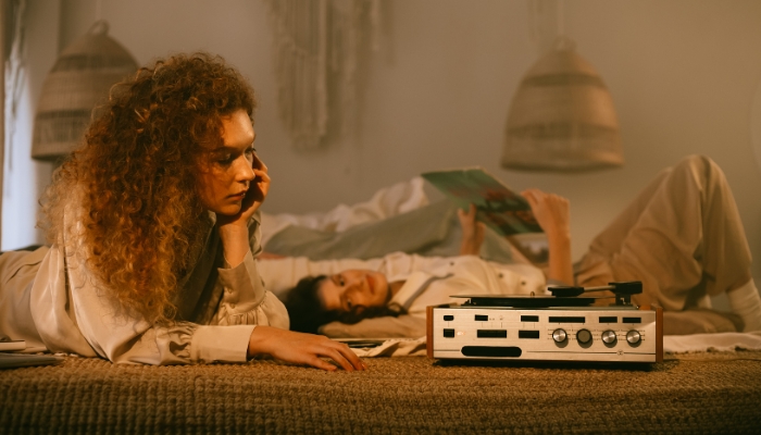 Two teens listening to latest record