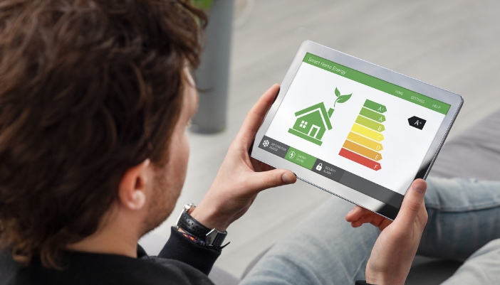 Closeup of a man looking at his smart home energy report