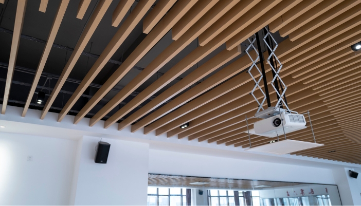 Closeup of a business space with mounted speakers