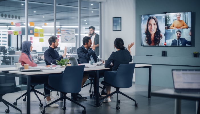 A corporate video conference meeting in the conference room