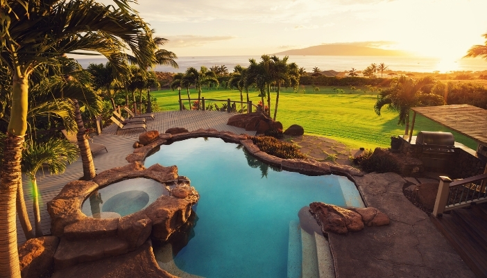 A luxury pool and hot tub