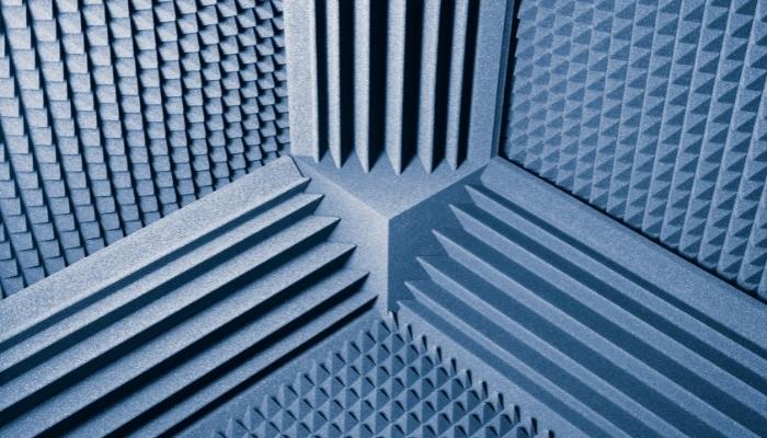 Acoustic paneling with bass traps in the corner