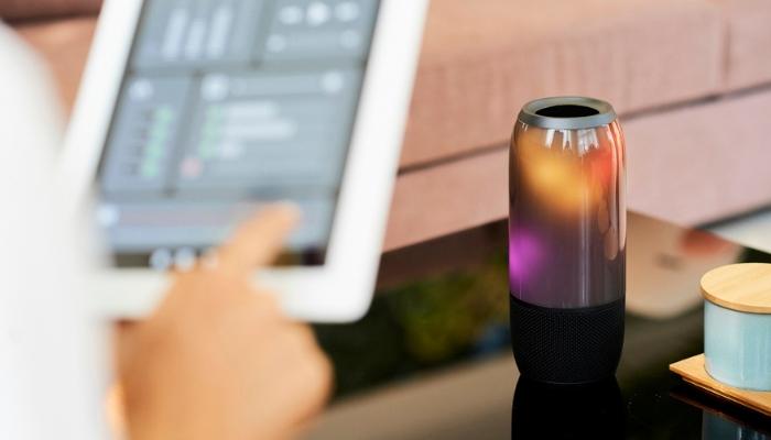 person using smart home application on tablet