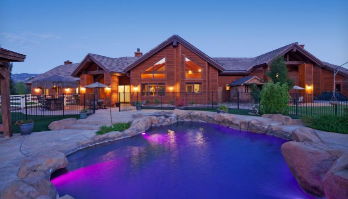 Colorful backyard lighting in the pool and other places