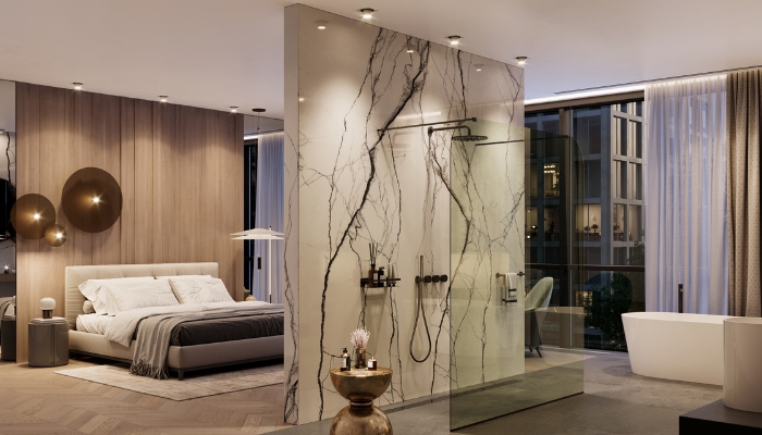 Bedroom with connected bath showcased different types of lighting