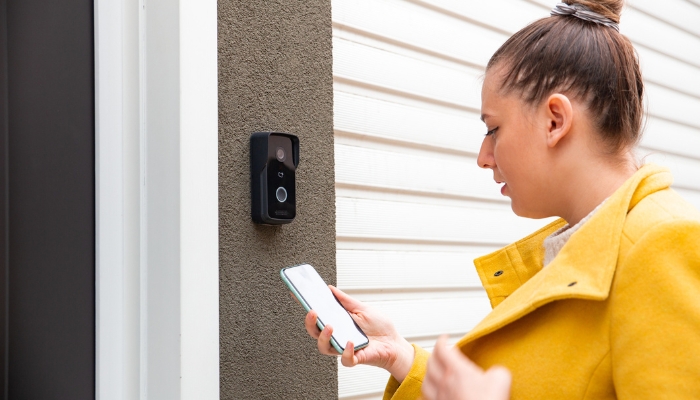 Dog walker looking up code to use to be let into the house