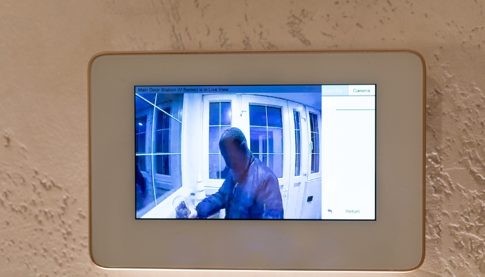 Control panel showing intruder at the door