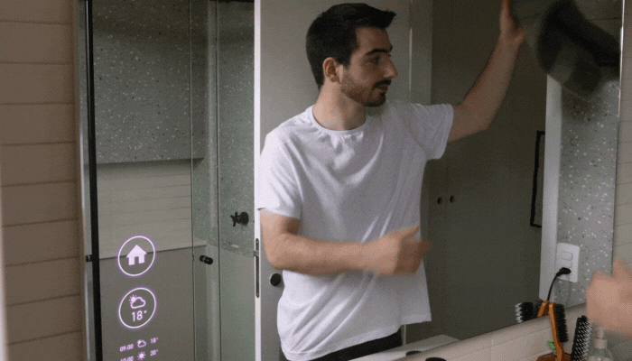 Man tells his smart mirror to start a pot of coffee with voice command
