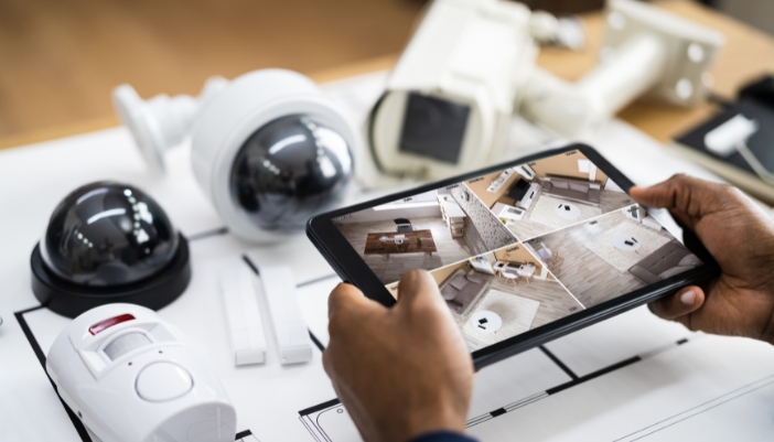 Concept image of someone with a smart home security setup