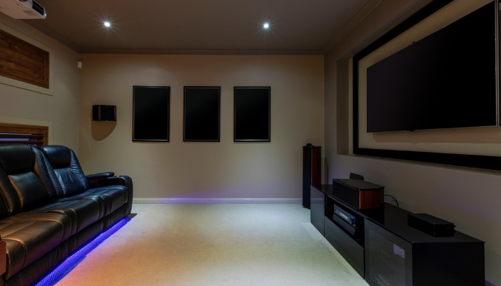A luxury home theater with speakers and soundproofing