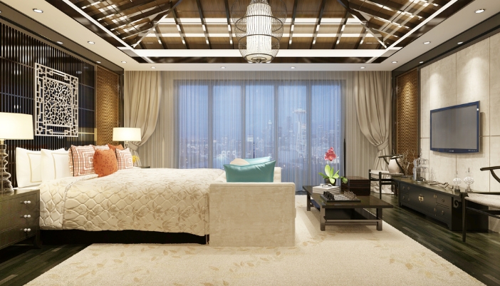 A luxury bedroom with architectural features highlighted with proper lighting design
