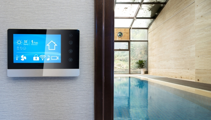 A control system sitting outside an indoor pool