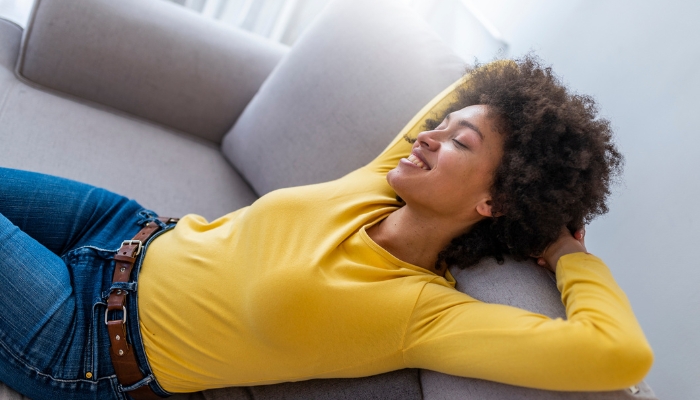woman enjoying music in listening room