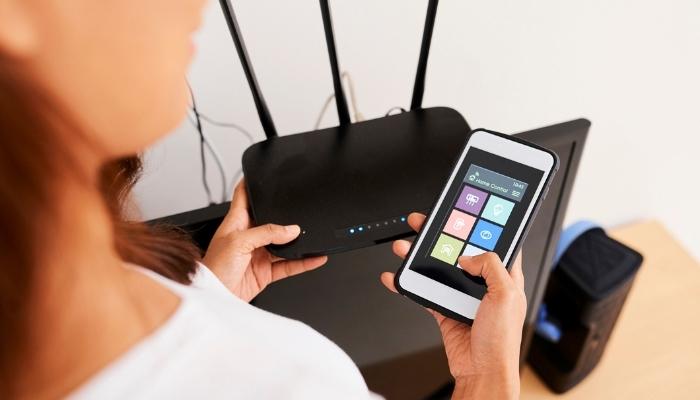 Woman trying to connect smart devices to network