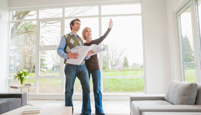 Couple making plans for their sports den