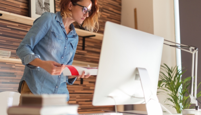 Woman concentrating in her smart home office