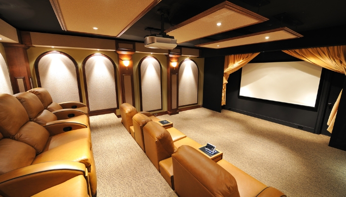 A home theater with automated lighting and custom controls