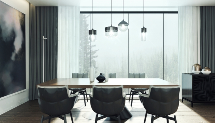 A modern home with shades adapting to real-time weather data of a cloudy and misty morning