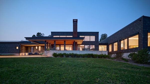 Modern home with landscape lighting installed