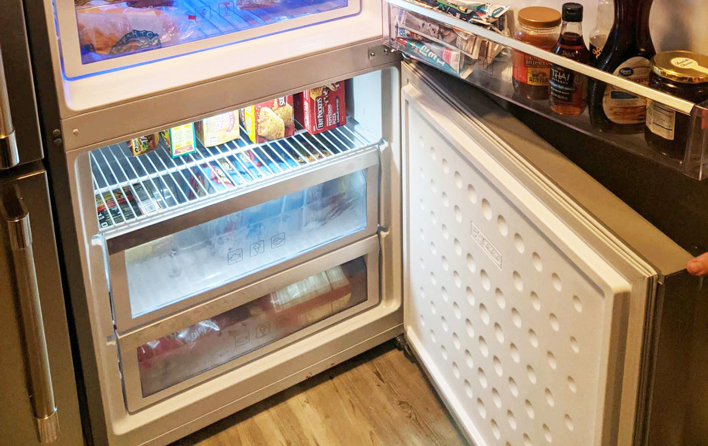 Up-close view of Beko freezer drawers stocked with food