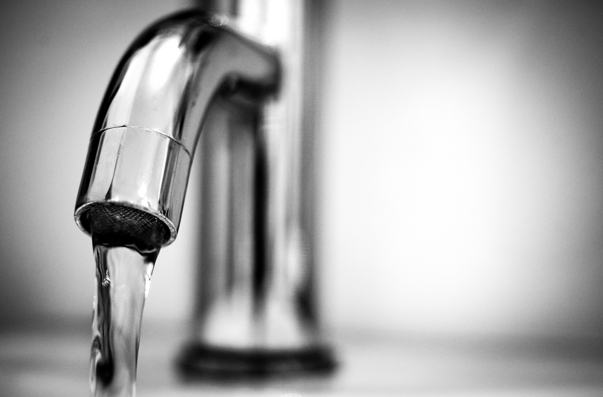 Close up of running faucet 