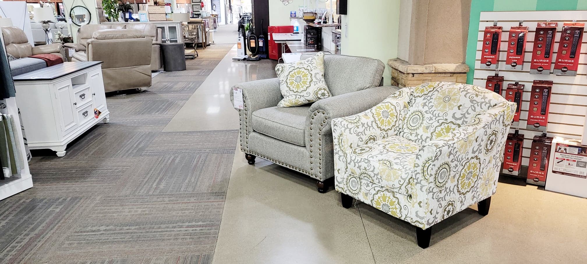 Romero Sterling chair shown inside Appliance Center showroom