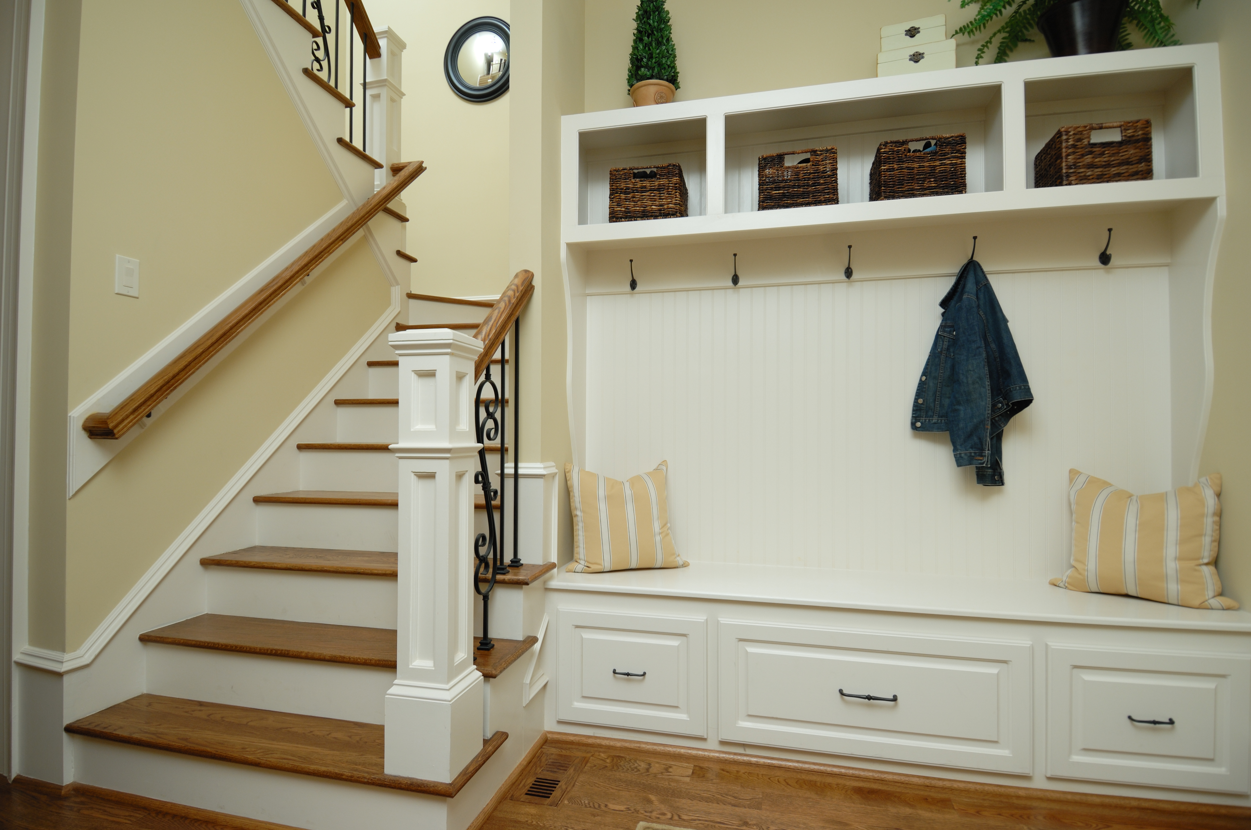 Entry way with a hall tree and hanging jackets 