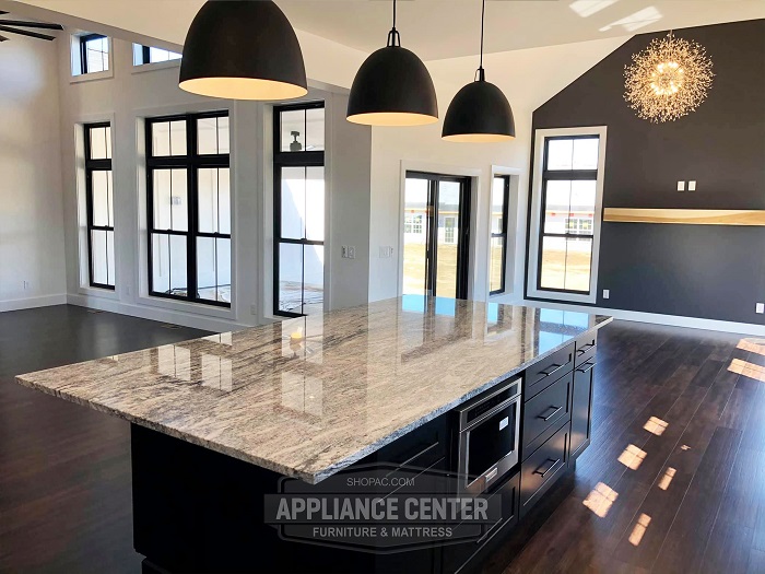 Looking down on a modern kitchen counter top island.