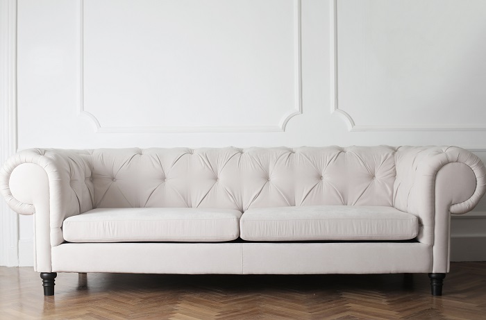 Large off white fabric sofa.