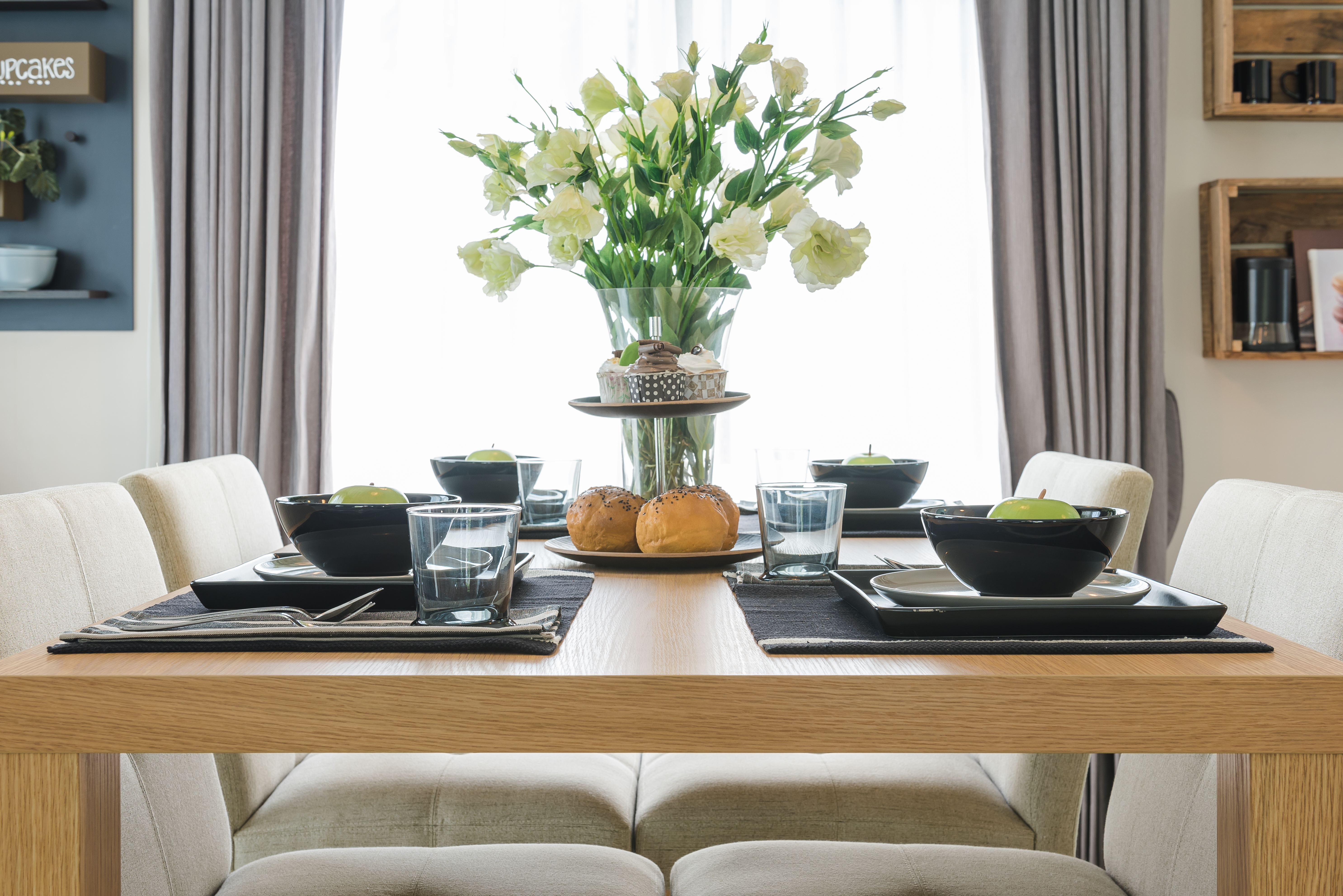 When decorating smaller dining tables, think minimal.