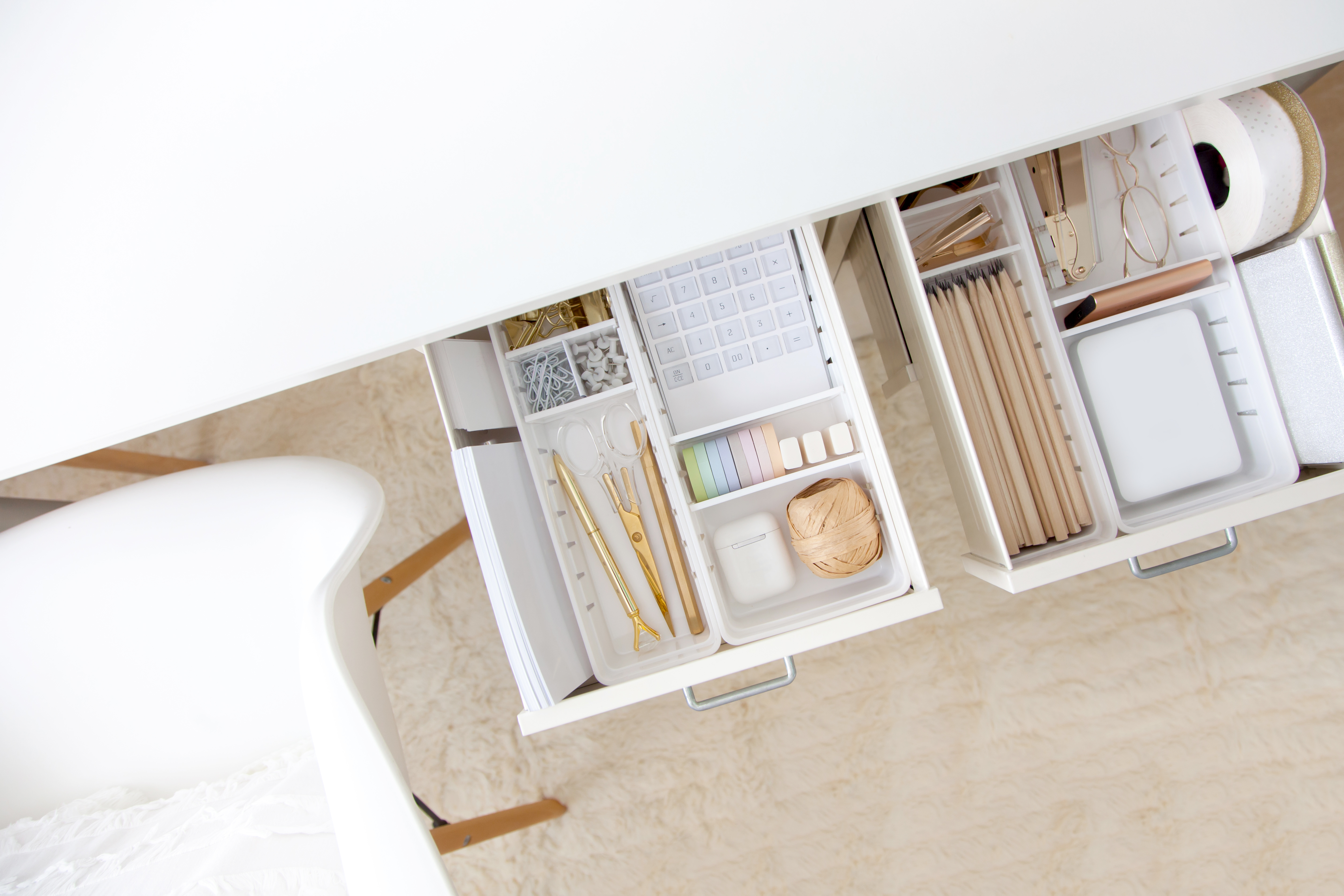 Trending for 2022 are desk accessory sets and organizers, work from home door signs, wood filing cabinets, wireless headsets and plants (real or artificial).