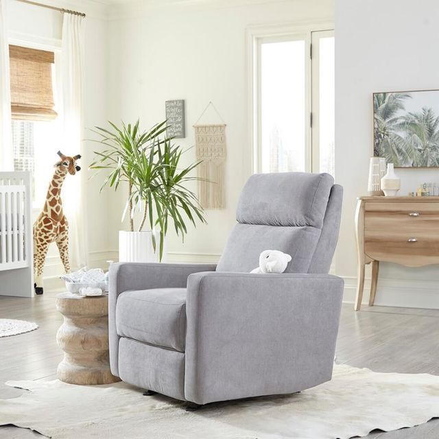 Gray-upholstered rocker recliner in a nursery 