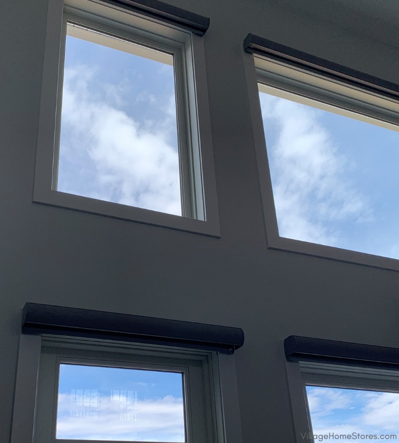 Great room windows with large window cassette style shades installed. Shown with shades rolled into cassette