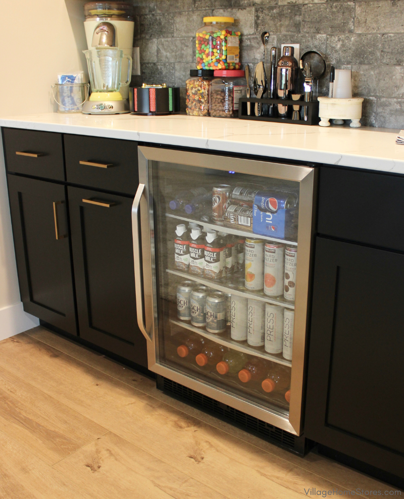 Danby glass door beverage cooler in a home bar. Appliances by Village Home Stores for Aspen Homes of the Quad Cities