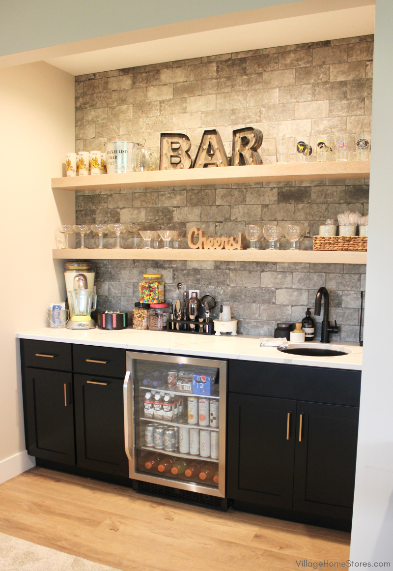 lower level home bar cabinets and floating shelves in a Bettendorf Iowa home