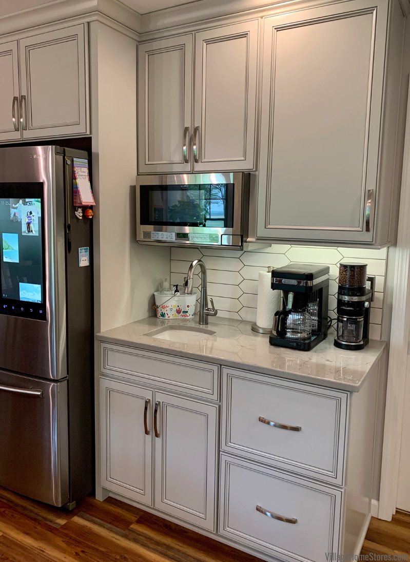 Stainless Over the Counter Sharp Microwave in an Oyster White painted kitchen