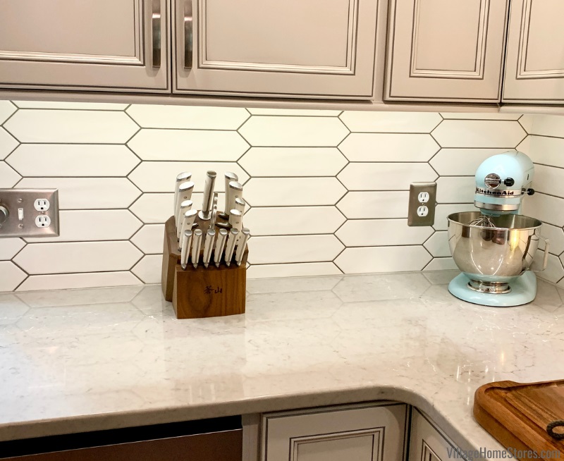 Cambria quartz countertops in the St Giles design installed in an Oyster White kitchen.