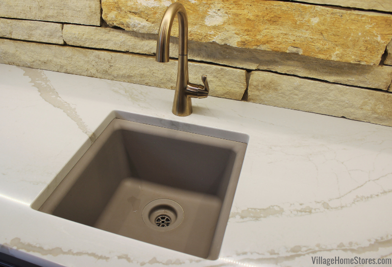 Wetbar single sink undermounted to Brittanicca Warm Cambria quartz tops.