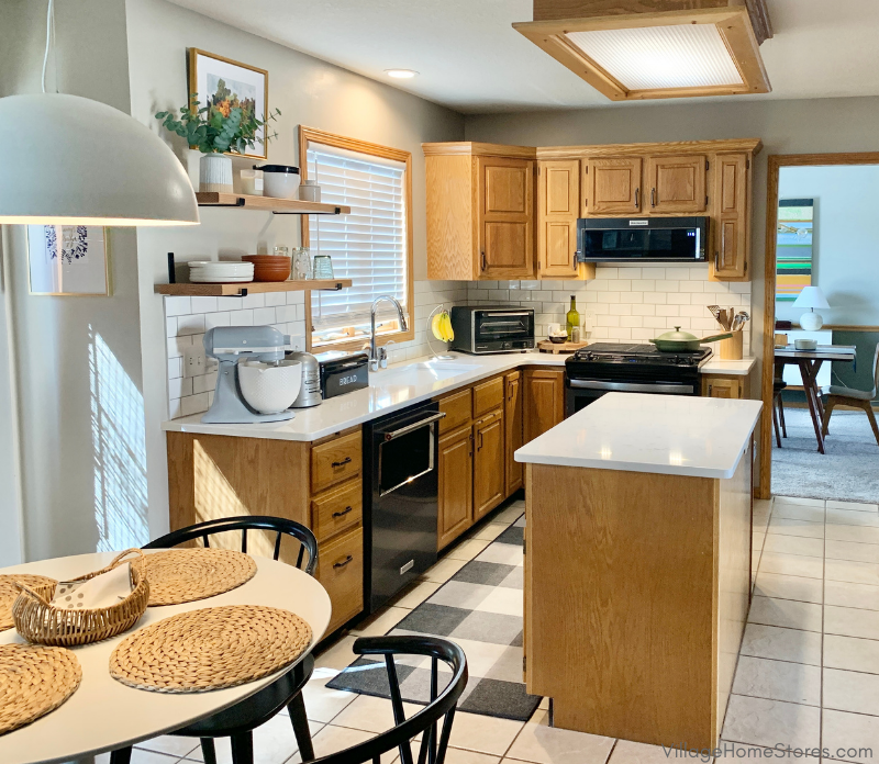 partial oak kitchen remodel reno in Moline with white subway tile and Swanbridge Cambria Quartz