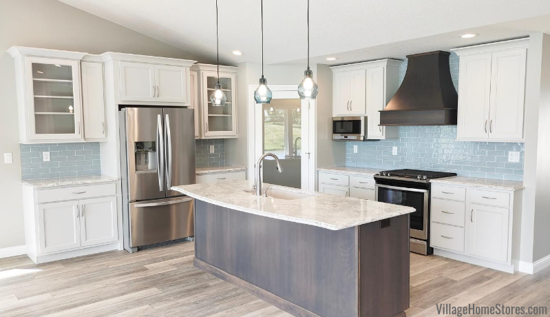 Kitchen with Oyster white painted cabinets and gray stained kitchen island at center