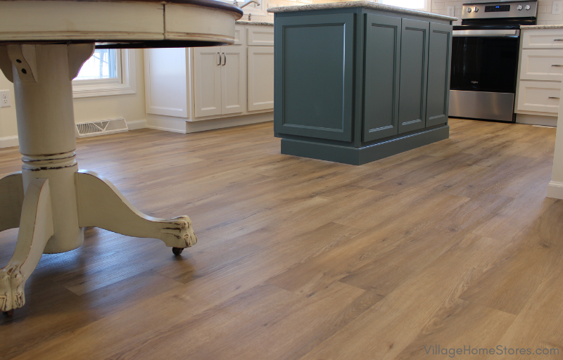 Key Largo plank engineered flooring in a lake house remodeled by Village Home Stores