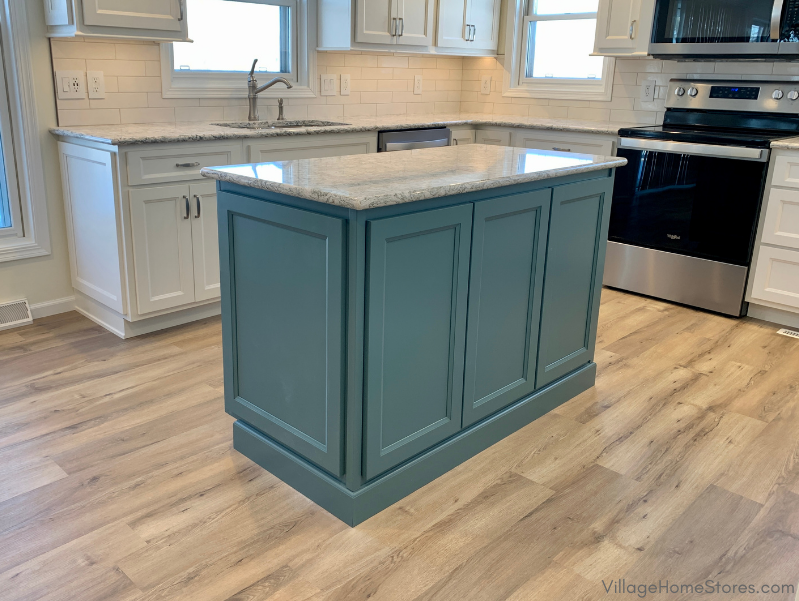 small kitchen island in teal blue green capri paint available from Koch Cabinetry